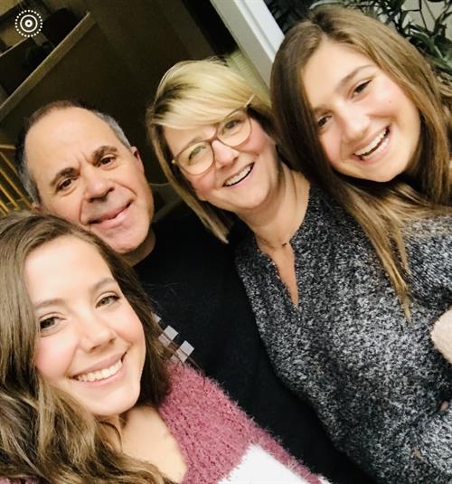 Mrs. Wagy, her husband and two daughters. Mrs. Wagy, her husband and two daughters.